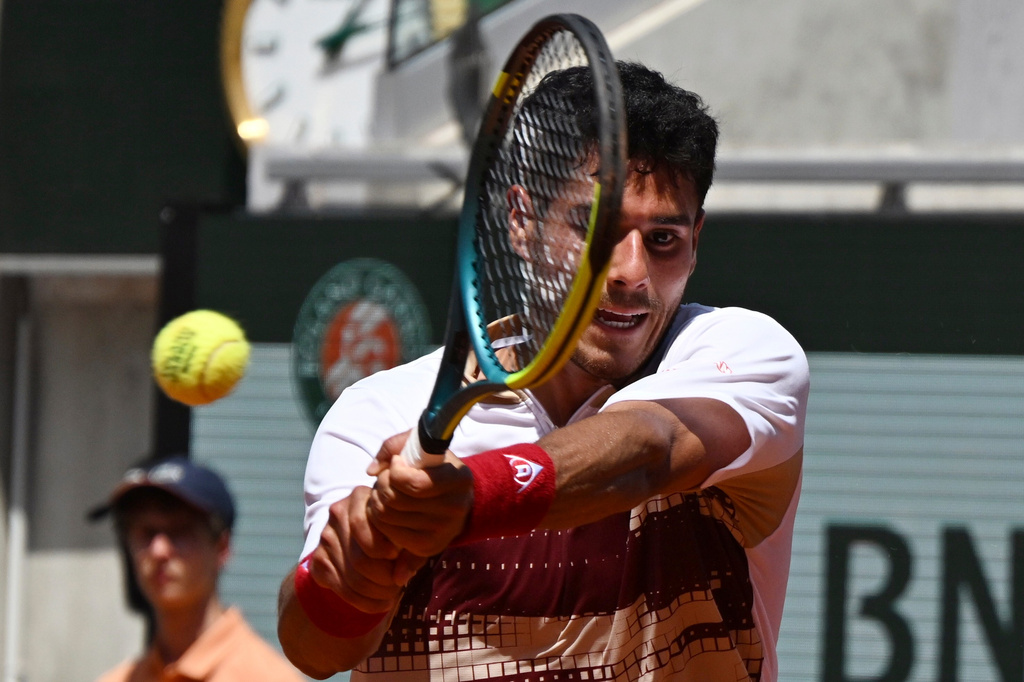 Adolfo Daniel Vallejo of Paraguay returns to Moise Kouame of France during their second round men's singles tennis match at the French Open tennis tournament in Paris, Thursday, May 28, 2026. (AP Photo/Emma Da Silva)