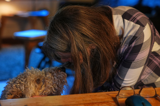 Mary E. Brunkow pets her dog Zelda after winning a Nobel Prize in medicine for part of her work on peripheral immune tolerance, in Seattle, Monday, Oct. 6, 2025. (AP Photo/Lindsey Wasson) Mary E. Brunkow pets her dog Zelda after winning a Nobel Prize in medicine for part of her work on peripheral immune tolerance, in Seattle, Monday, Oct. 6, 2025. (AP Photo/Lindsey Wasson)