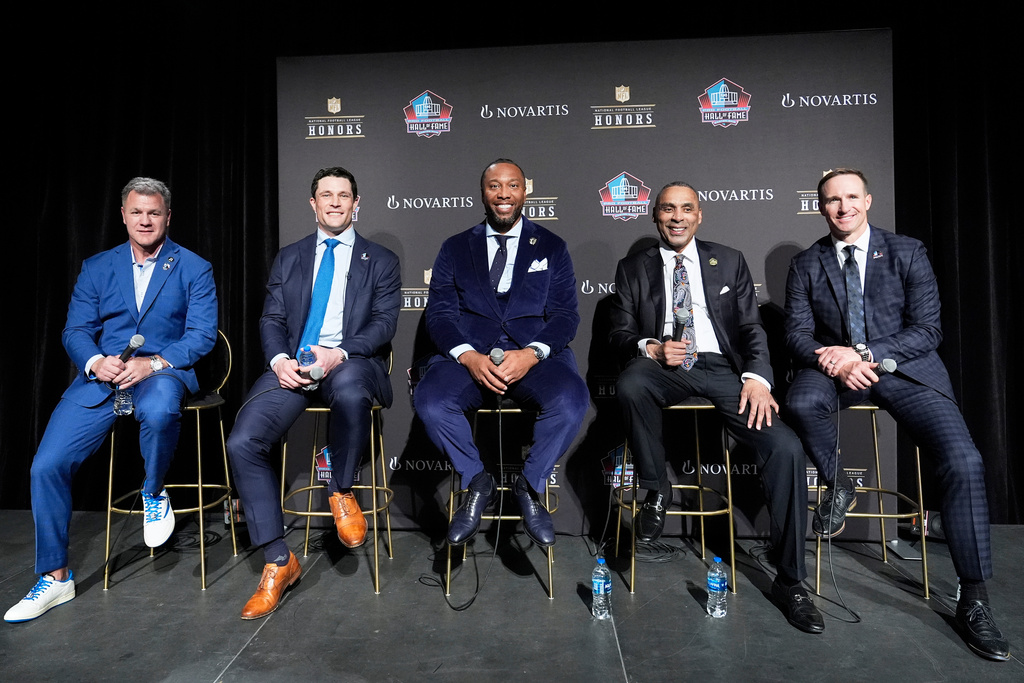 Adam Vinatieri, from left, sits with Luke Kuechly, Larry Fitzgerald, Roger Craig and Drew Brees after being announced for the Pro Football Hall of Fame class of 2026 during football's NFL Honors award show in San Francisco, Thursday, Feb. 5, 2026. (AP Photo/Brynn Anderson)