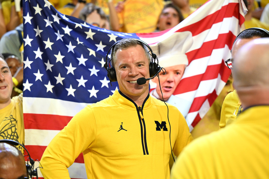 FILE - Michigan head coach Dusty May talks with the media following their a win over Michigan State after an NCAA college basketball game in Ann Arbor, Mich., March 8, 2026. (AP Photo/Lon Horwedel, file)