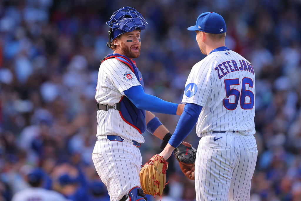Chicago Cubs' Carson Kelly, left, and Ryan Zeferjahn (56) celebrate after a baseball game against the Miami Marlins, Thursday, Sept. 24, 2026, in Chicago. (AP Photo/Melissa Tamez)