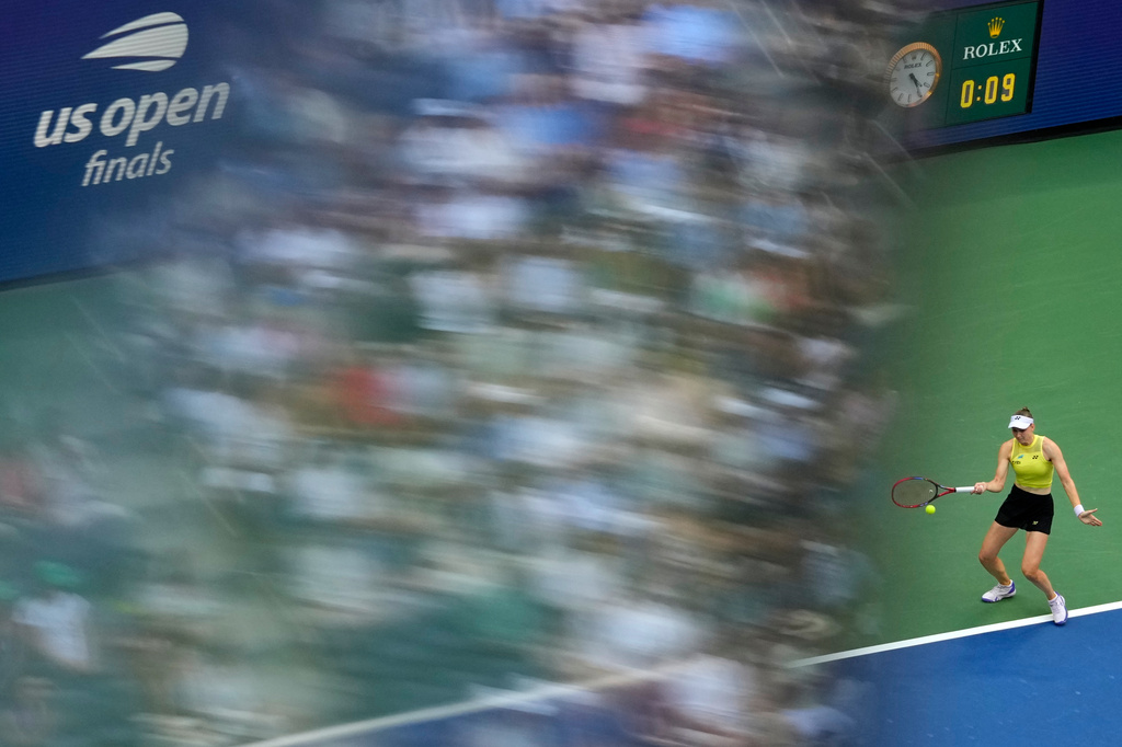 Elena Rybakina, of Kazakhstan, returns the ball to Aryna Sabalenka, of Belarus, during the women's singles final of the U.S. Open tennis championships Saturday, Sept. 12, 2026, in New York. (AP Photo/Yuki Iwamura)