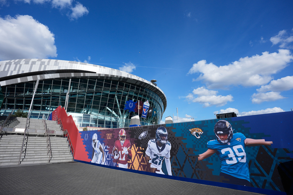 An exterior of Tottenham Hotspur stadium in London ahead of an NFL game between the Washington Commanders and the Indianapolis Colts, Friday, Oct. 2, 2026. (AP Photo/Steve Luciano)