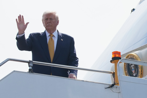 President Donald Trump waves as he boards Air Force One at Kuala Lumpur International Airport in Sepang, Malaysia, as he departs for Japan, Monday, Oct. 27, 2025. (AP Photo/Mark Schiefelbein) President Donald Trump waves as he boards Air Force One at Kuala Lumpur International Airport in Sepang, Malaysia, as he departs for Japan, Monday, Oct. 27, 2025. (AP Photo/Mark Schiefelbein)