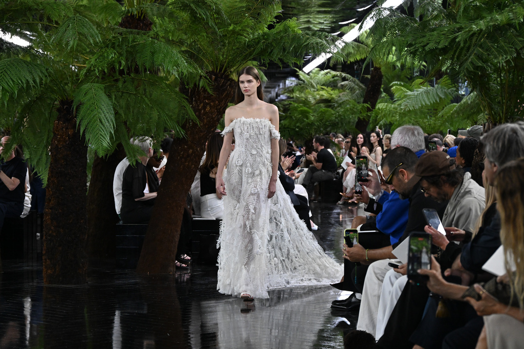 A model wears a creation as part of the Christian Dior Haute Couture Fall/Winter 2026-2027 Women's collection presented in Paris, Monday, July 6, 2026. (AP Photo/Emma Da Silva)