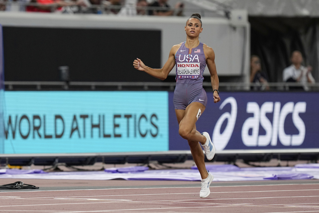United States' Sydney McLaughlin-Levrone competes in the women's 400 meters semifinal at the World Athletics Championships in Tokyo, Tuesday, Sept. 16, 2025. (AP Photo/Eugene Hoshiko)