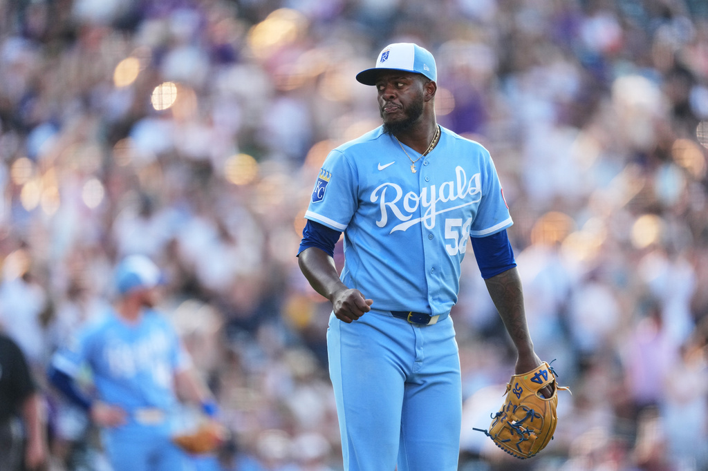 Kansas City Royals starting pitcher Luinder Avila reacts after giving up a three-run home run to Colorado Rockies' Hunter Goodman in the third inning of a baseball game Saturday, Aug. 1, 2026, in Denver. (AP Photo/David Zalubowski)