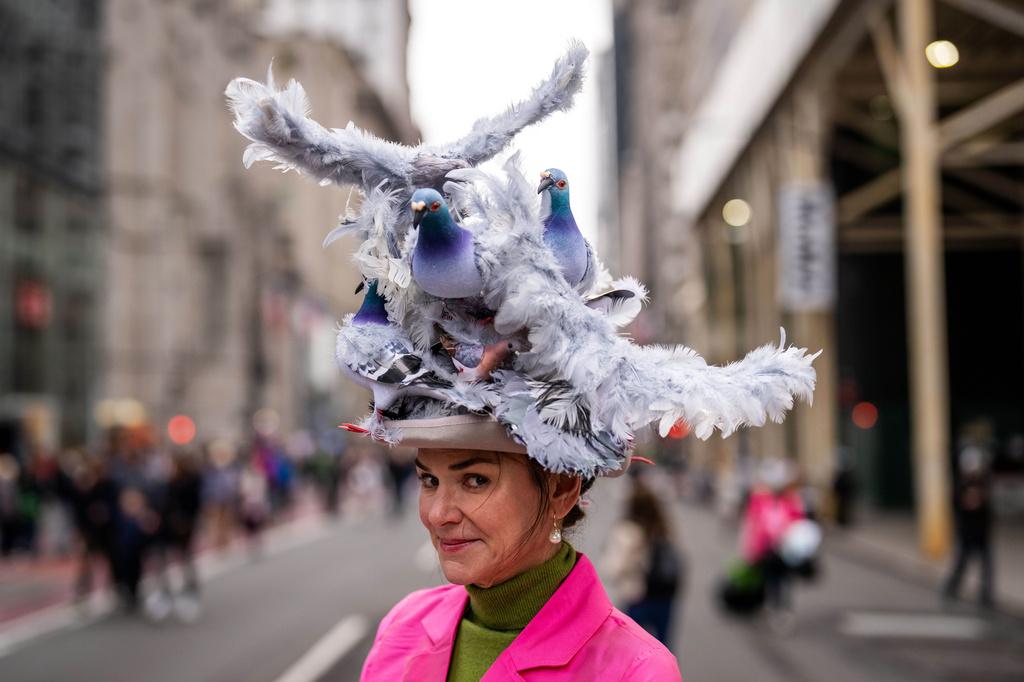 Kerry Auld wears a pigeon themed hat during the Easter Bonnet Parade on Fifth Avenue, Sunday, April 5, 2026, in New York. (AP Photo/Adam Gray)