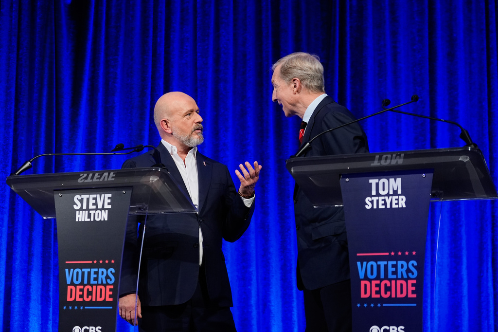 Steve Hilton and Tom Steyer speak during a break in a California gubernatorial debate hosted by CBS Bay Area and the San Francisco Examiner in San Francisco, Thursday, May 14, 2026. (AP Photo/Godofredo A. Vásquez, Pool)