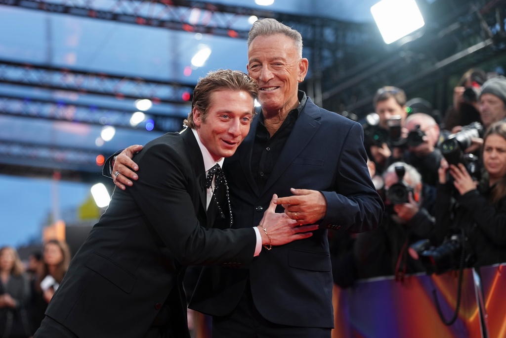 Jeremy Allen White, left and Bruce Springsteen pose for photographers upon arrival at the premiere of the film "Springsteen: Deliver Me From Nowhere" during the London film festival in London, Wednesday, Oct. 15, 2025. (Photo by Scott A Garfitt/Invision/AP)
