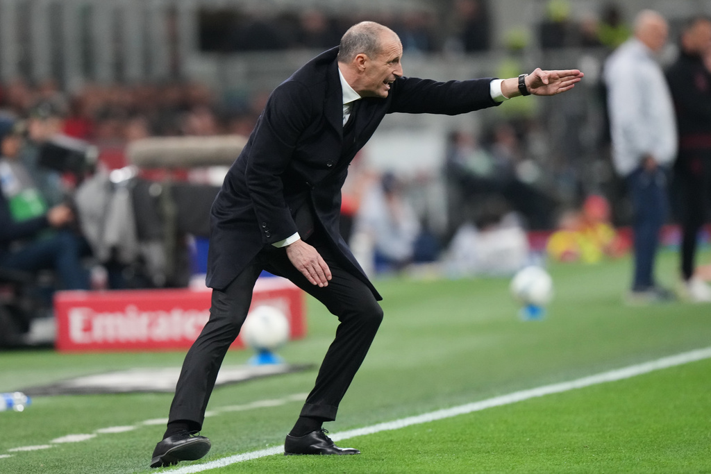 AC Milan's head coach Massimiliano Allegri gestures during the Serie A soccer match between AC Milan and Torino, in Milan, Italy, Saturday, March 21, 2026. (AP Photo/Luca Bruno)