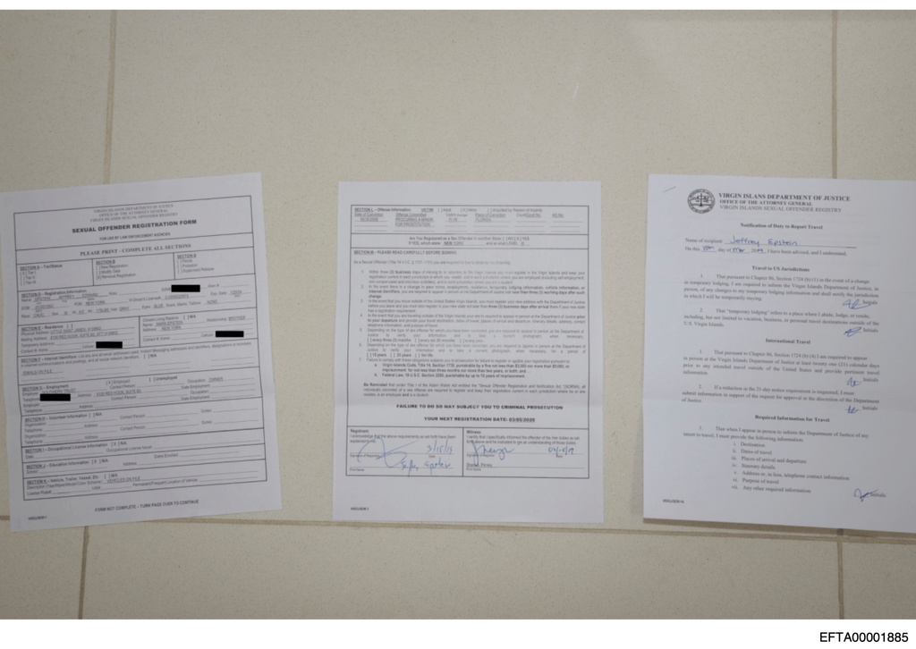 This redacted photo released by the U.S. Department of Justice shows Jeffrey Epstein's sexual offender registration form, documented on Aug. 12, 2019, during a search of Epstein's home on Little St. James island in the U.S. Virgin Islands. (U.S. Department of Justice via AP)