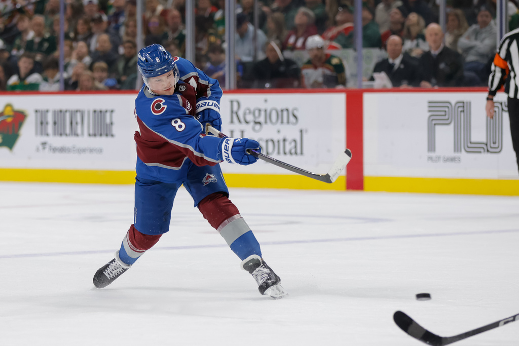 Colorado Avalanche defenseman Cale Makar scores during the second period of an NHL hockey game against the Minnesota Wild, Sunday, Dec. 21, 2025, in St. Paul, Minn. (AP Photo/Bailey Hillesheim)