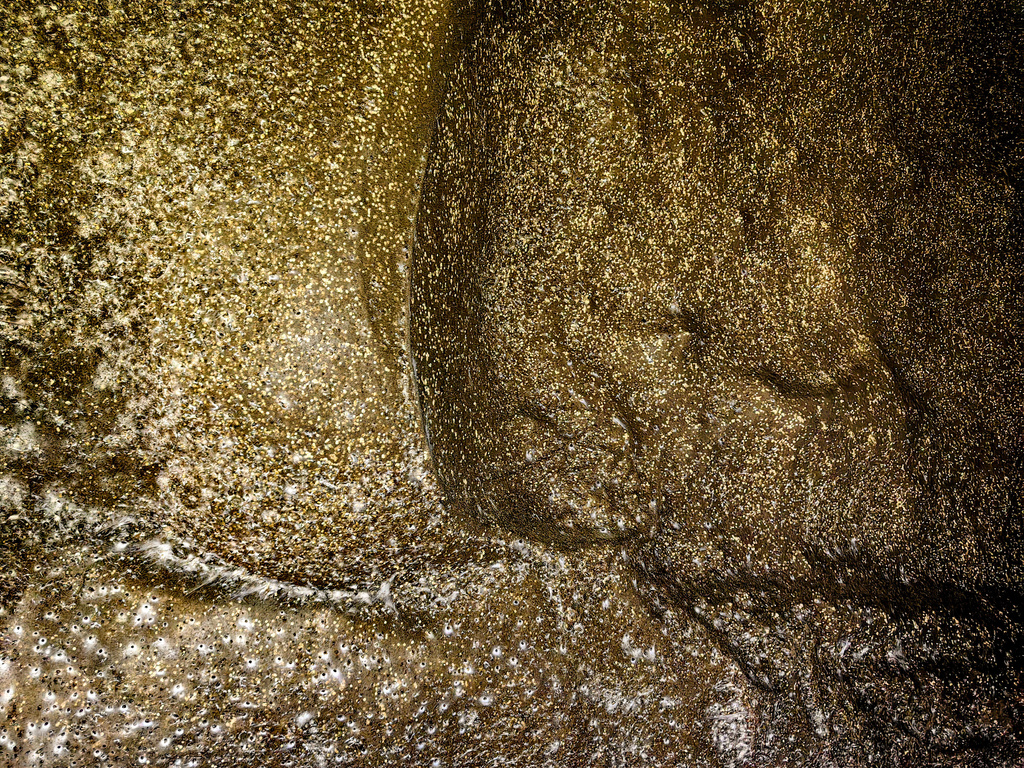An undated image shows spider webs on a wall in Sulfur Cave, on the Greek-Albanian border. (Istvan Urak via AP)