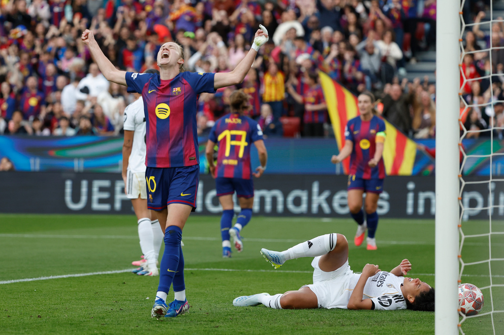 Barcelona's Graham Hansen celebrates after scoring her side's second goal during a Champions League quarterfinal soccer match between Barcelona and Real Madrid, in Barcelona, Spain, Thursday, April 2 2026. (AP Photo/Joan Monfort)