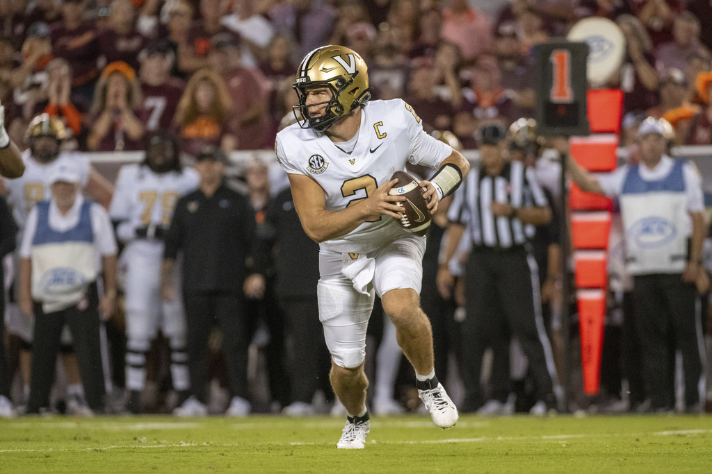 Vanderbilt quarterback Diego Pavia looks to pass the ball against Virginia Tech during the first half of an NCAA college football game Saturday, Sept. 6, 2025, in Blacksburg, Va. (AP Photo/Robert Simmons)