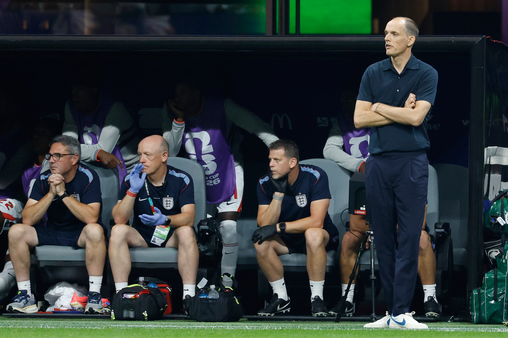 England head coach Thomas Tuchel, right, and his staff watch during the World Cup semifinal soccer match between England and Argentina in Atlanta, Wednesday, July 15, 2026. (AP Photo/Erik S. Lesser)