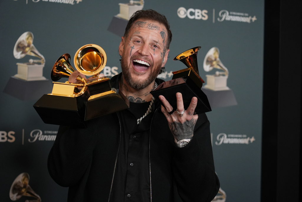 Jelly Roll poses in the press room with the award for best contemporary country album for "Beautifully Broken" during the 68th annual Grammy Awards on Sunday, Feb. 1, 2026, in Los Angeles. (Photo by Richard Shotwell/Invision/AP)