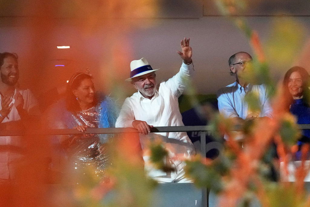 FILE - Brazilian President Luiz Inacio Lula da Silva, accompanied by first lady Rosangela, attends the Academicos de Niteroi samba school parade in his honor, during Carnival celebrations at the Sambadrome in Rio de Janeiro, Feb. 15, 2026. (AP Photo/Silvia Izquierdo, File)