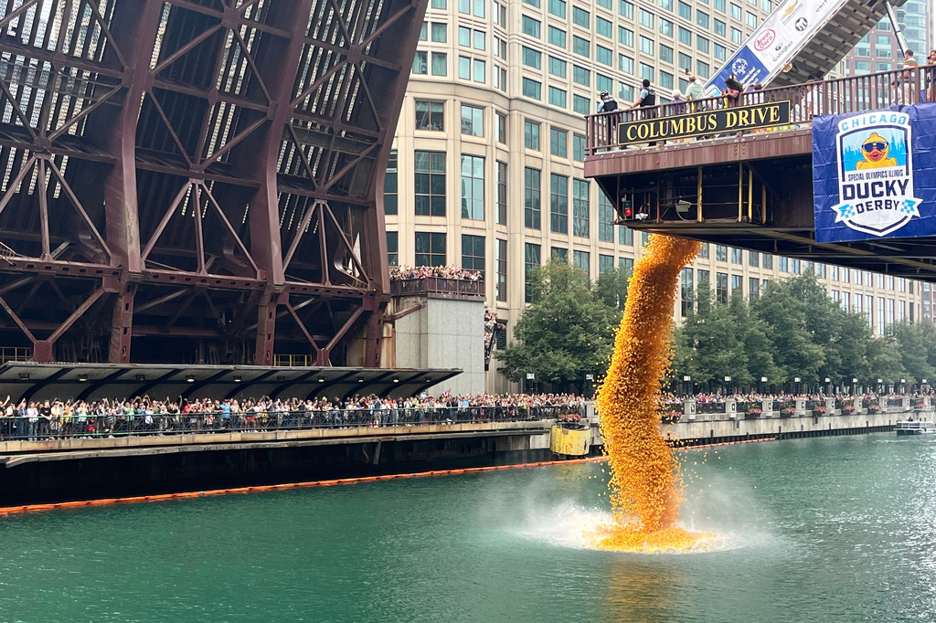 More than 90 thousand rubber ducks are dropped into the Chicago River as part of the annual Chicago Duck Derby for Special Olympics Illinois in Chicago, Thursday, Aug. 6, 2026. (AP Photo/Cybele Mayes-Osterman)