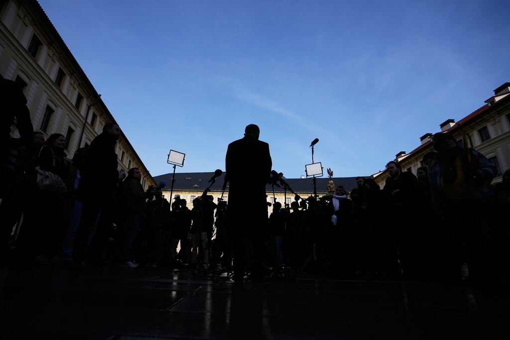 Leader of ANO political movement Andrej Babis addresses the media after being sworn in as the country's new prime minister at the Prague Castle in Prague, Czech Republic, Tuesday, Dec. 9, 2025. (AP Photo/Petr David Josek)
