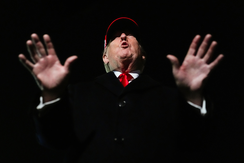 President Donald Trump speaks with reporters after disembarking Air Force One, Sunday, April 12, 2026, at Joint Base Andrews, Md. (AP Photo/Julia Demaree Nikhinson)