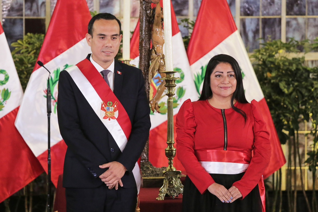 FILE - Peru's President Jose Jeri, left, and Economy Minister Denisse Miralles pose during a swearing-in ceremony for cabinet members at the government palace in Lima, Peru, Oct. 14, 2025. (AP Photo/Gerardo Marin, File)