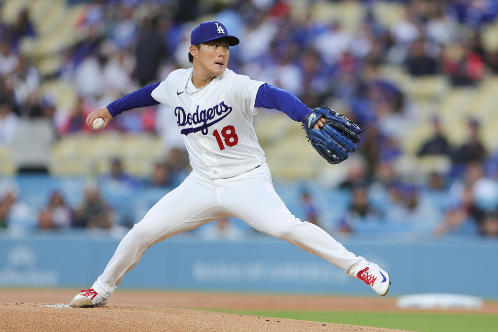 Los Angeles Dodgers starting pitcher Yoshinobu Yamamoto delivers during the first inning of a baseball game against the Miami Marlins, Monday, April 27, 2026, in Los Angeles. (AP Photo/Ryan Sun)