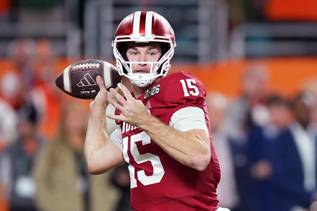 Indiana quarterback Fernando Mendoza passes against Miami during the first half of the College Football Playoff national championship game, Monday, Jan. 19, 2026, in Miami Gardens, Fla. (AP Photo/Rebecca Blackwell)