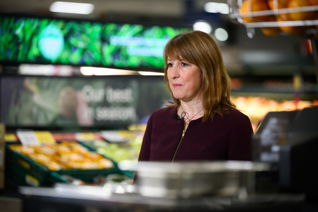 British Chancellor of the Exchequer Rachel Reeves speaks to the media during a visit to a branch of the Tesco supermarket chain, in London, Wednesday Nov. 19, 2025 in. (Leon Neal/Pool Photo via AP)