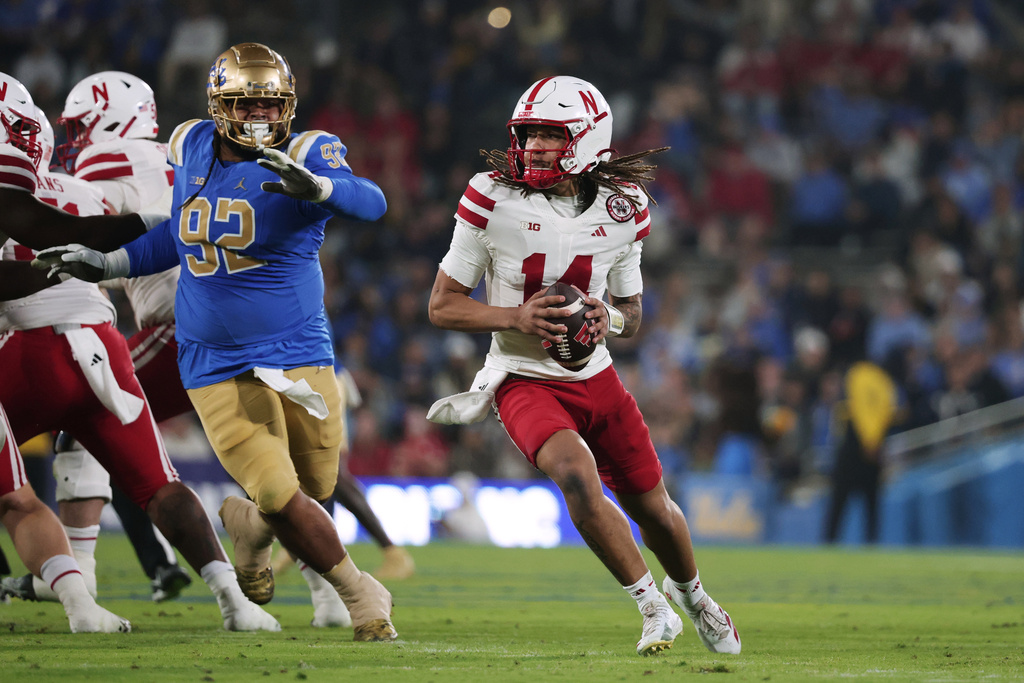 Nebraska quarterback TJ Lateef (14) looks for an opening against UCLA during the first half of an NCAA college football game Saturday, Nov. 8, 2025, in Pasadena, Calif. (AP Photo/Ethan Swope)