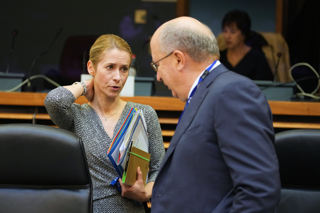 European Union foreign policy chief Kaja Kallas, left, speaks with European Commissioner for Defense and Space Andrius Kubilius during the weekly College of Commissioners meeting at EU headquarters in Brussels, Belgium, Tuesday, Nov. 4, 2025. (AP Photo/Virginia Mayo)