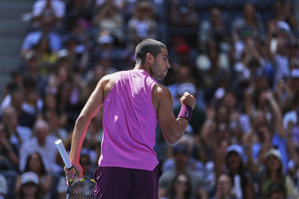 Carlos Alcaraz, of Spain, reacts during his match against Arthur Rinderknech, of France, during the fourth round of the U.S. Open tennis championships, Sunday, Aug. 31, 2025, in New York. (AP Photo/Heather Khalifa)