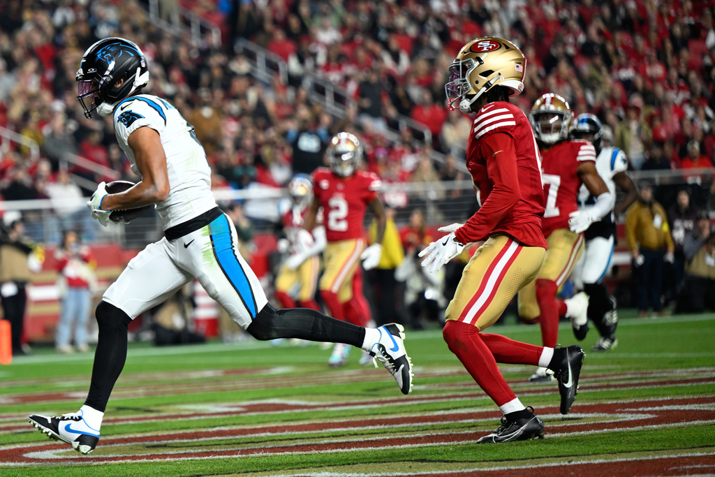 Carolina Panthers wide receiver Tetairoa McMillan scores against the San Francisco 49ers during the second half an NFL football game, Monday, Nov. 24, 2025, in Santa Clara, Calif. (AP Photo/Eakin Howard)
