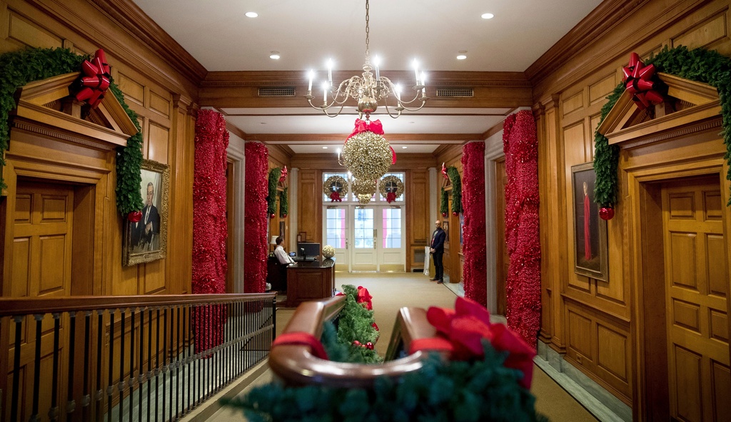 FILE - The East Wing hallway of the White House is decorated for the holiday season, Nov. 29, 2016, in Washington. (AP Photo/Andrew Harnik, File)