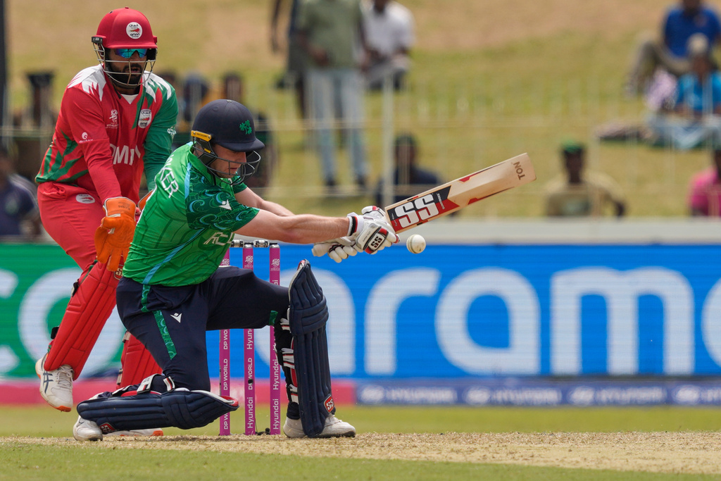 Ireland's Lorcan Tucker plays a shot during the T20 World Cup cricket match between Ireland and Oman in Colombo, Sri Lanka, Saturday, Feb. 14, 2026. (AP Photo/Eranga Jayawardena)