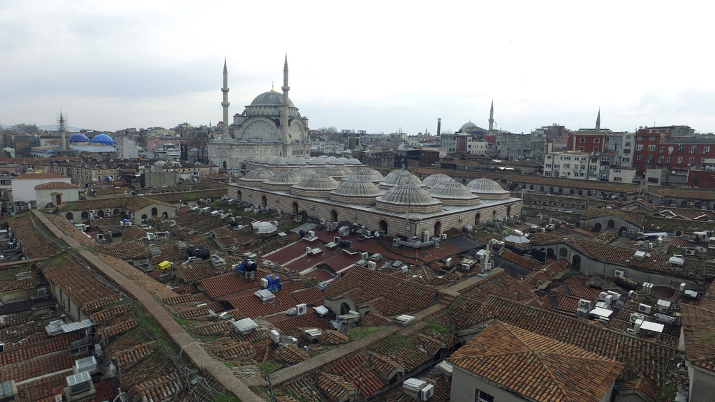 FILE - Aerial photo taken with a drone shows the roof of Istanbul's centuries-old Grand Bazaar, foreground, Feb. 1, 2016. (Ali Aksoyer/DHA via AP, File)