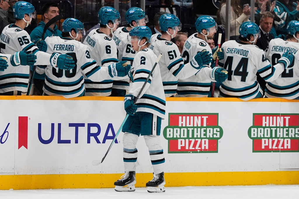 San Jose Sharks center Will Smith (2) celebrates his goal with teammates during the second period of an NHL hockey game against the Nashville Predators, Tuesday, March 24, 2026, in Nashville, Tenn. (AP Photo/George Walker IV)