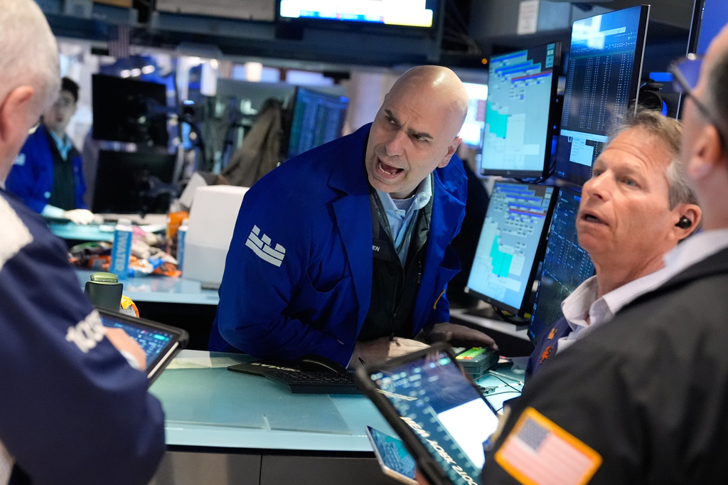 Philip Finale works on the floor at the New York Stock Exchange in New York, Tuesday, April 7, 2026. (AP Photo/Seth Wenig)
