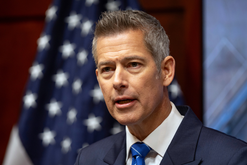 Transportation Secretary Sean Duffy speaks during a news conference at the Department of Transportation in Washington, Friday, Dec. 12, 2025. (AP Photo/Mark Schiefelbein)