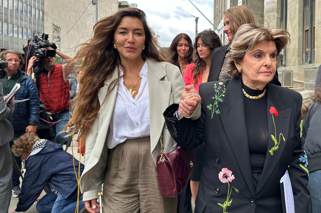 Miriam Haley, accompanied by attorney, Gloria Allred, exits Manhattan Supreme Court after Harvey Weinstein was sentenced to 15 years in prison for sexually assaulting Haley in 2006, Wednesday, Sept. 23, 2026, in New York. (AP Photo/Michael Sisak)
