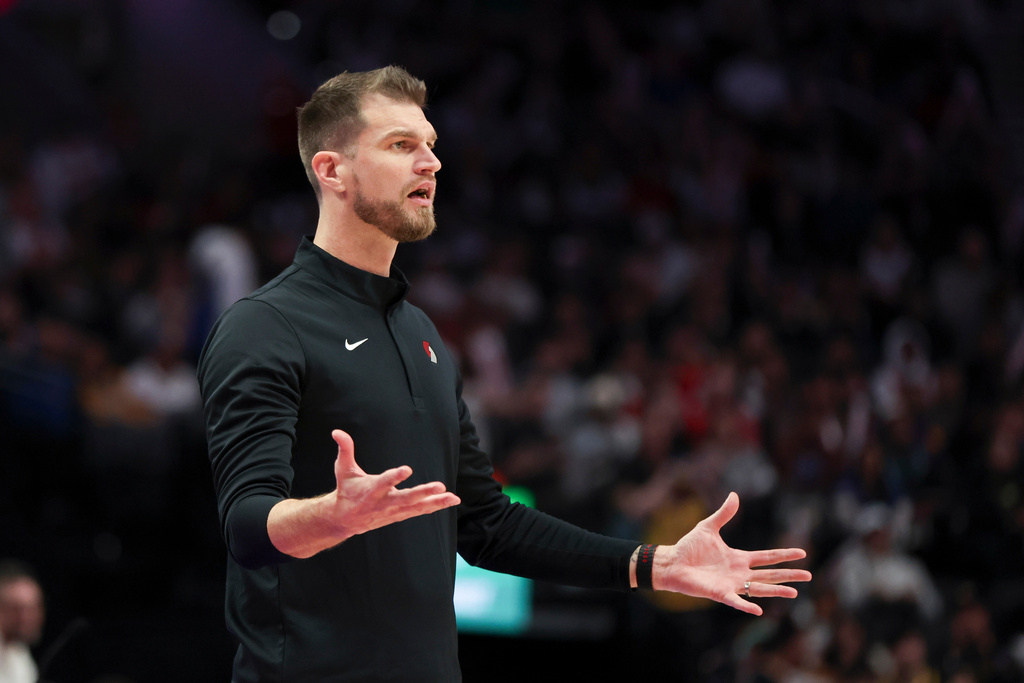 Portland Trail Blazers acting head coach Tiago Splitter reacts to a call during the second half of an NBA basketball game against the Golden State Warriors Friday, Oct. 24, 2025, in Portland, Ore. (AP Photo/Amanda Loman)