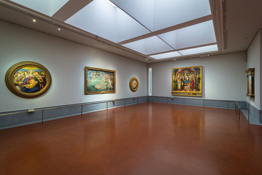 This picture made available Tuesday, June 16, 2026 shows the renovated and refurbished Botticelli rooms, with Renaissance master Sandro Botticelli's paintings: from left, "Madonna of the Pomegranate", "The birth of Venus""Madonna of the Magnificat" and "San Barnaba Altarpiece" displayed at Florence's Uffizi Gallery Museum, Italy. (Press Office of the Uffizi Gallery Museum via AP)