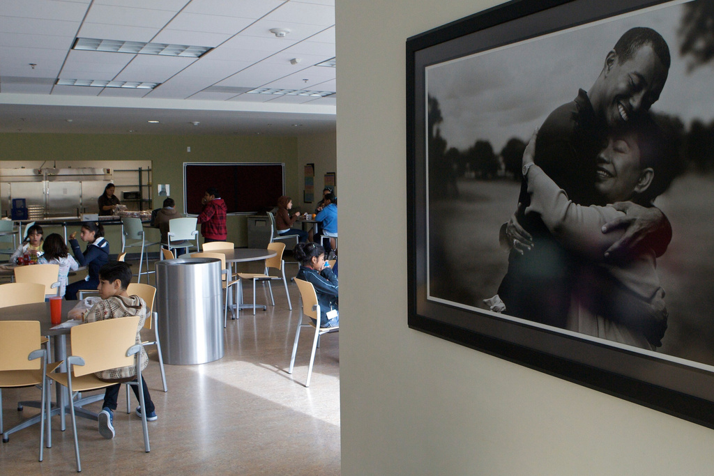 FILE - Students attend classes at Tiger Woods Learning Center, Jan. 15, 2010, in Anaheim, Calif. (AP Photo/Damian Dovarganes, File)