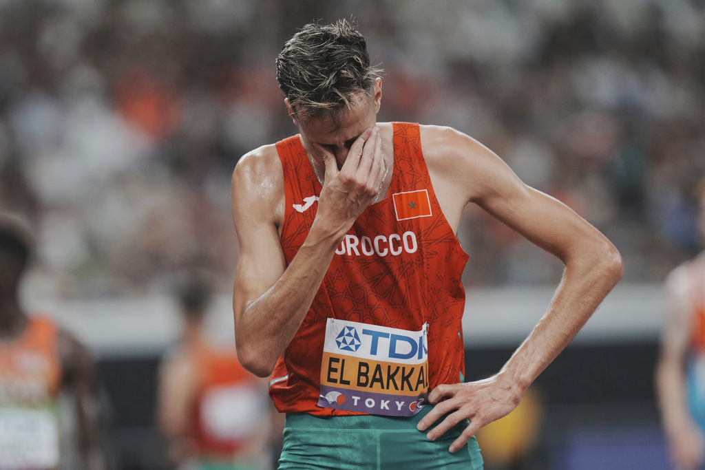 Silver medalist Morocco's Soufiane El Bakkali reacts after competing in the men's 3,000 meters steeplechase final at the World Athletics Championships in Tokyo, Monday, Sept. 15, 2025. (AP Photo/Eugene Hoshiko)