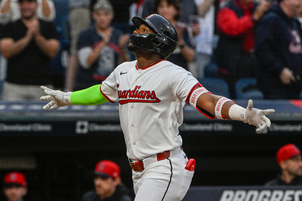 Cleveland Guardians' Angel Martinez reacts after hitting a two-run home run off Athletics starting pitcher Jacob Lopez during the first inning of a baseball game, Saturday, Sept. 19, 2026, in Cleveland. (AP Photo/Phil Long)