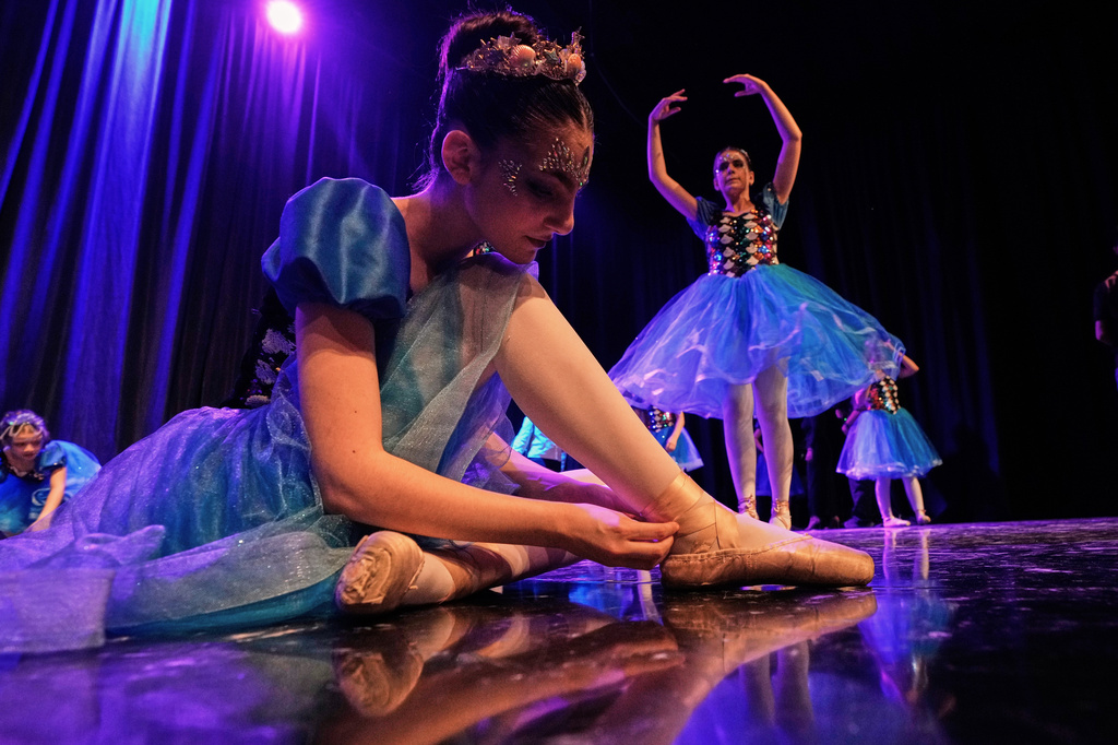 Students from the Baghdad Ballet Academy prepare to perform in a production titled "Mermaid" at Al-Sinbad Theater in Baghdad, Iraq, Friday, Sept. 25, 2026. (AP Photo/Hadi Mizban)