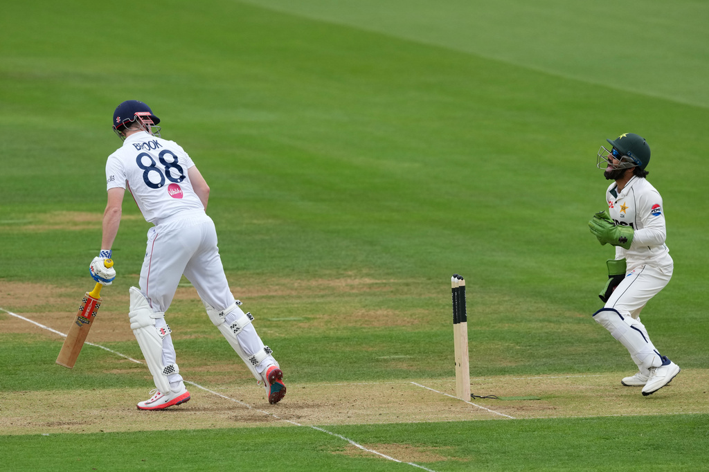 England's Harry Brook is caught out by Pakistan's Mohammad Rizwan, right, on day three of the second cricket test match between England and Pakistan in London, Saturday, Aug. 29, 2026. (AP Photo/Dave Shopland)