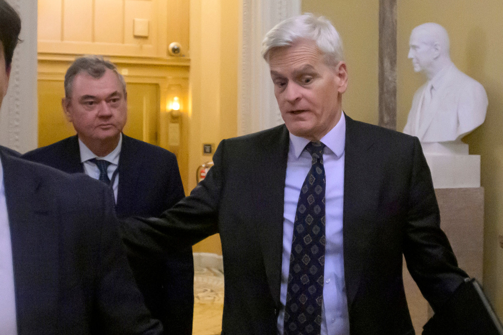 Sen. Bill Cassidy, R-La., departs the U.S. Capitol prior to a confirmation vote for acting Attorney General Todd Blanche, Friday, Aug. 7, 2026, in Washington. (AP Photo/Rod Lamkey, Jr.)