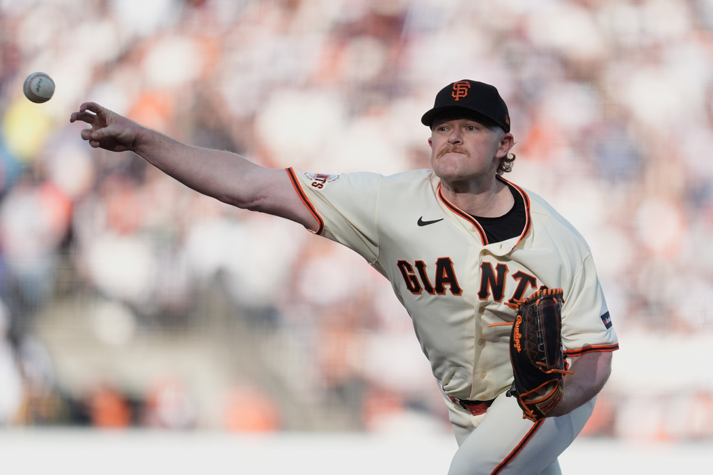 San Francisco Giants pitcher Logan Webb works against the New York Yankees during the first inning of a baseball game in San Francisco, Wednesday, March 25, 2026. (AP Photo/Jeff Chiu)